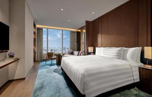 Pan Pacific Jakarta客房内的一张或多张床位