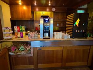 Kuchyň nebo kuchyňský kout v ubytování Hotel Silvana Garnì