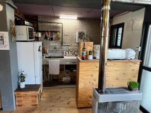 Toyako Guest House Ponkotan tesisinde mutfak veya mini mutfak