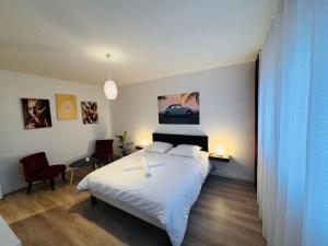 Postel nebo postele na pokoji v ubytování Appartement Chalon