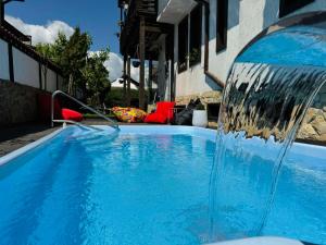 Bazén v ubytování Guest house Elit nebo v jeho okolí