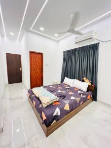 Katil atau katil-katil dalam bilik di HemaRay villa - luxury stay with pool