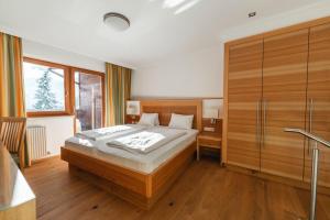 Posteľ alebo postele v izbe v ubytovaní Genusshotel Fichtenhof
