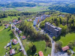 an aerial view of a building in a field at Inviting apartment in Freyung with sauna indoor pool in Freyung