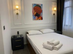 Postel nebo postele na pokoji v ubytování Global Termal Hotel