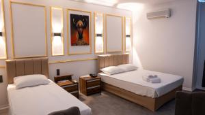 Postel nebo postele na pokoji v ubytování Global Termal Hotel + 35 fotografií