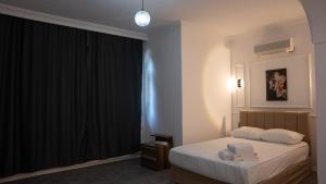 Postel nebo postele na pokoji v ubytování Global Termal Hotel