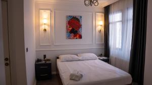 Postel nebo postele na pokoji v ubytování Global Termal Hotel