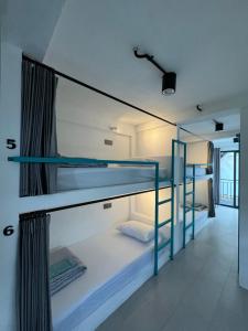 Postel nebo postele na pokoji v ubytování Canggu Central Hostel