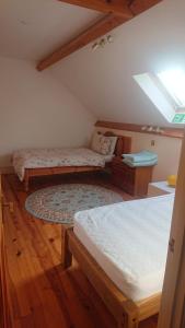 A bed or beds in a room at The Barn Annexe, Cefn-Yr-Allt