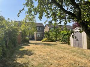 an empty yard in front of a house at Meadow Lark in Old Somerby