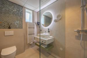 Koupelna v ubytování Leonardo Hotel Breda City Center + 29 fotografií
