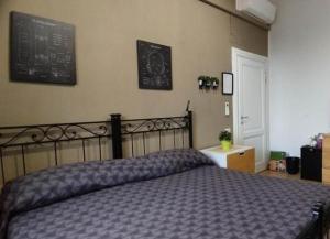 A bed or beds in a room at Casa Lambruschini