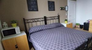 A bed or beds in a room at Casa Lambruschini