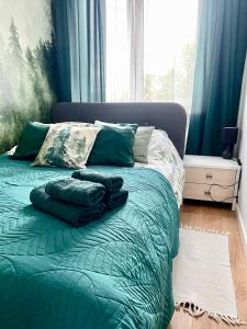 Posteľ alebo postele v izbe v ubytovaní Chillout Airport Apartment KL33 - air condition & free parking