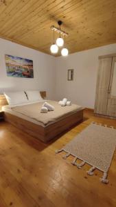 Ένα ή περισσότερα κρεβάτια σε δωμάτιο στο ΔΙΟΝΥΣΙΑ ΑΡΗΣ