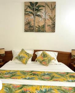 Postel nebo postele na pokoji v ubytování La Marigalantine - Wifi, Plage, Terrasse + 21 fotografií