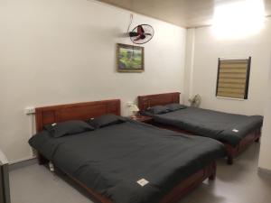 Postel nebo postele na pokoji v ubytování Núi Homestay Sa Pa