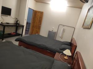 Postel nebo postele na pokoji v ubytování Núi Homestay Sa Pa