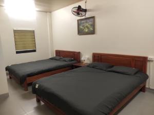 Postel nebo postele na pokoji v ubytování Núi Homestay Sa Pa
