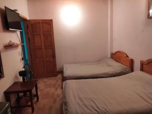 Postel nebo postele na pokoji v ubytování Núi Homestay Sa Pa