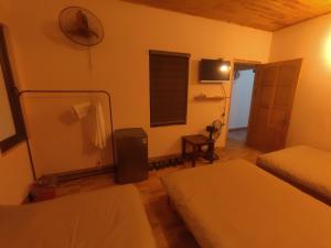 Postel nebo postele na pokoji v ubytování Núi Homestay Sa Pa