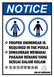 in piscina è obbligatorio indossare un costume da bagno adeguato. di Prestige Troika Luxury Stay a Kota Bharu
