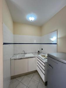 a kitchen with a sink and a stove at Tempio del Sole in Terni