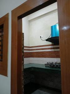 Een badkamer bij Haridwar Homestay
