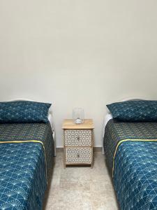 En eller flere senge i et værelse på Crumisi - turismo rurale salento