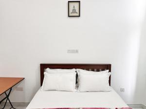 Llit o llits en una habitació de Sea View Condo by Ceylon Spaces
