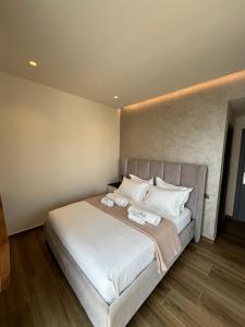 Postel nebo postele na pokoji v ubytování Hotel Utopia