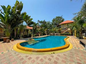 Bazén v ubytování Baan Bali Beach Resort Pranburi nebo v jeho okolí + 37 fotografií