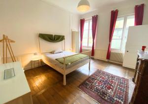 Postel nebo postele na pokoji v ubytování Le Cordeliers #18 - Poitiers - LaConciergerie