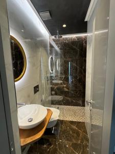 Koupelna v ubytování Hotel Utopia