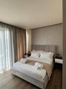 Postel nebo postele na pokoji v ubytování Hotel Utopia
