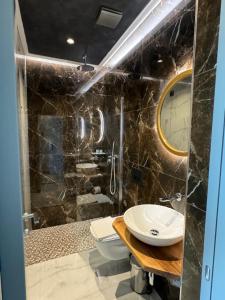 Koupelna v ubytování Hotel Utopia