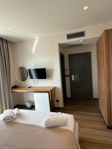 Postel nebo postele na pokoji v ubytování Hotel Utopia