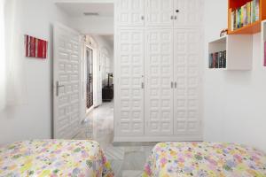 Ένα ή περισσότερα κρεβάτια σε δωμάτιο στο Verano Azul +22 φωτογραφίες