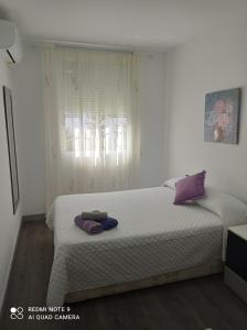 Ένα ή περισσότερα κρεβάτια σε δωμάτιο στο Villa Alegría