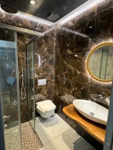 Koupelna v ubytování Hotel Utopia