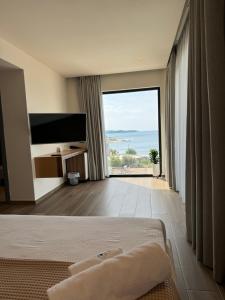 Postel nebo postele na pokoji v ubytování Hotel Utopia