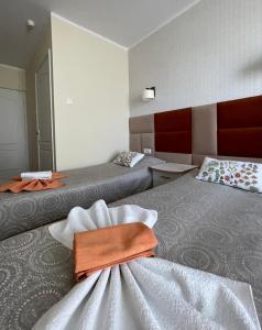 Postel nebo postele na pokoji v ubytování Damroka