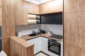 Kuchyň nebo kuchyňský kout v ubytování Apartman Kolarević