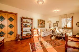 a living room filled with lots of furniture at Casa Aldrovandi in Capoliveri