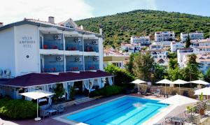 a view of a hotel with a swimming pool at Villa Anfora in Datca