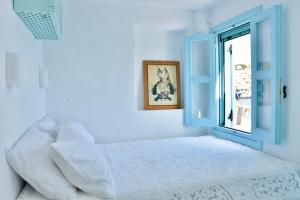 Postel nebo postele na pokoji v ubytování SALT RETREAT - Seafront Villa