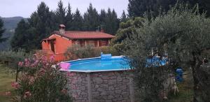 Bazén v ubytování Tenuta Cerbaiola with Pool, Garden & Parking nebo v jeho okolí