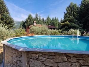 Bazén v ubytování Tenuta Cerbaiola with Pool, Garden & Parking nebo v jeho okolí