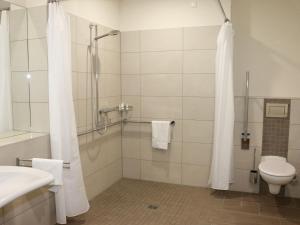 Koupelna v ubytování Leben wie im Hotel by Helios